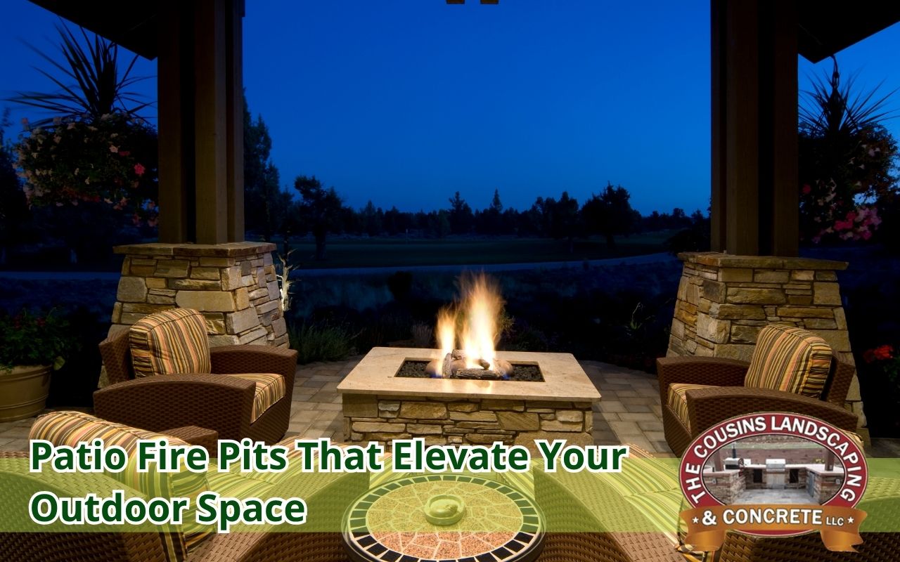 Fire pit installed in the center of a concrete patio with chairs around