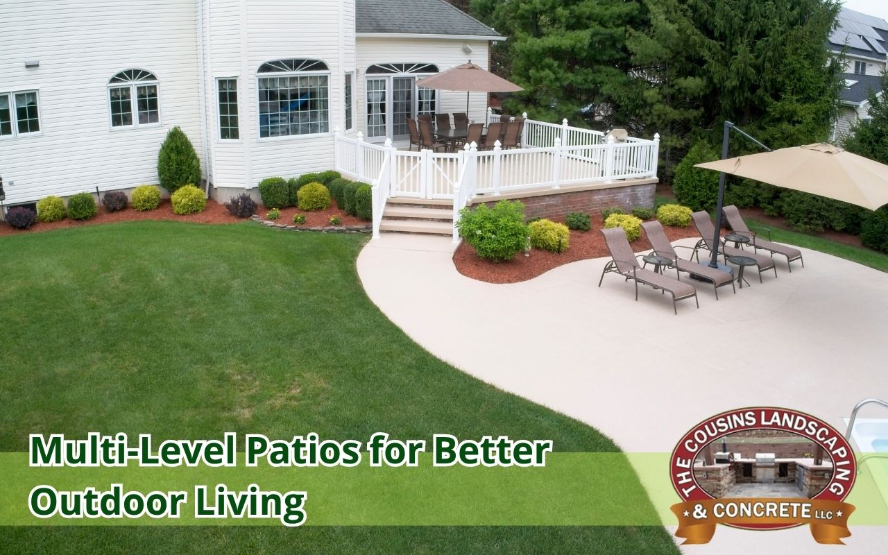 Multi-level concrete patio with separate zones in backyard
